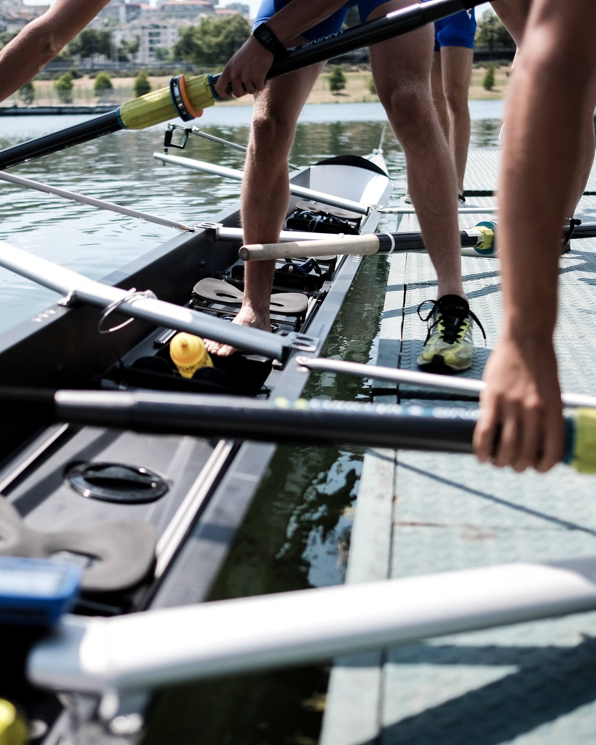 A crew rigging up and boarding at the dock